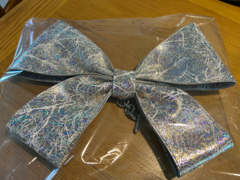 Brand New White Cosmic Bow Silver Colour Hardware 