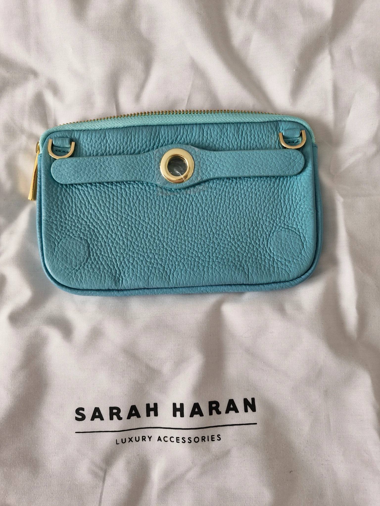 Ocean pouch gold hardware 