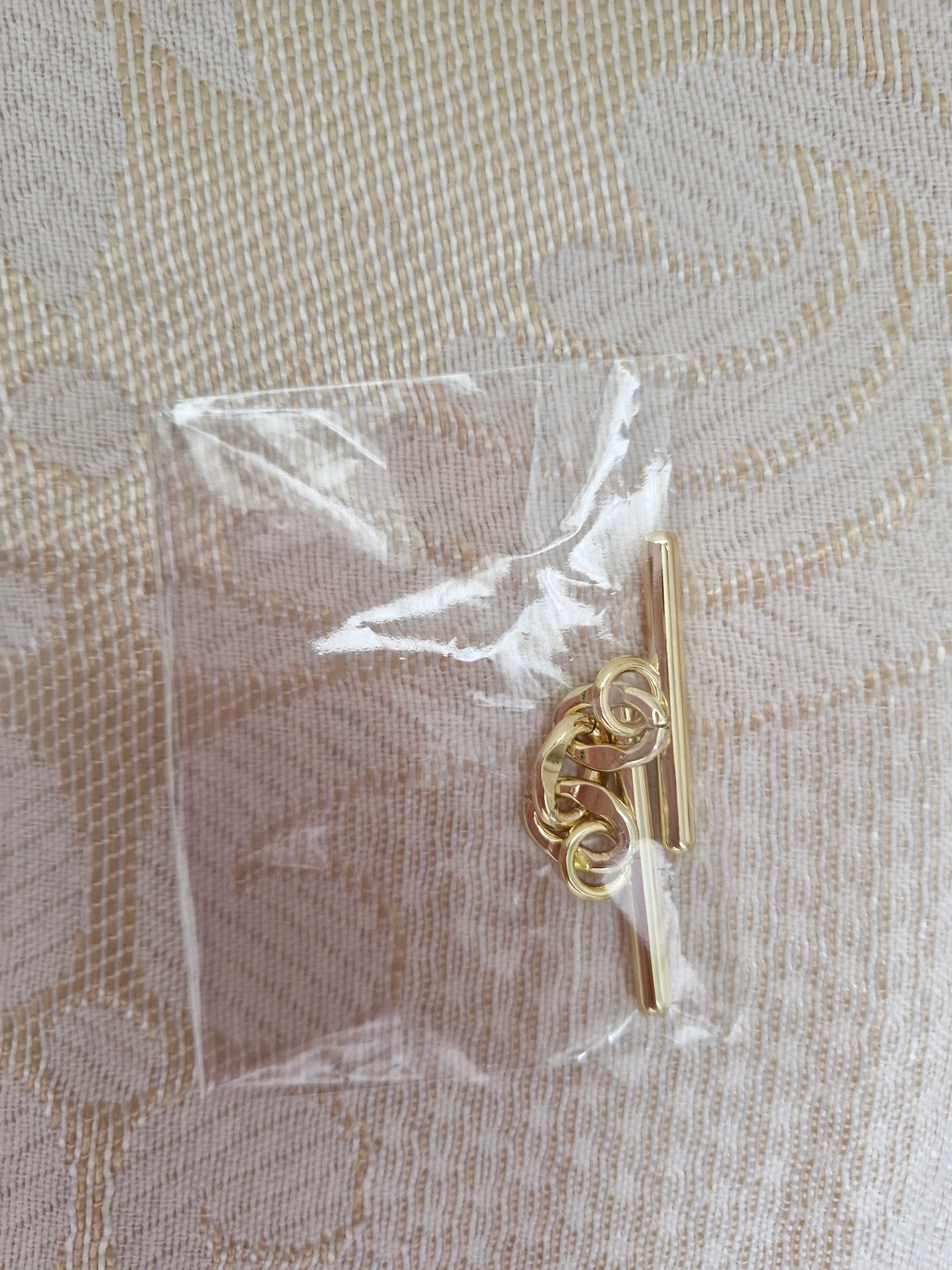 Gold toggle 