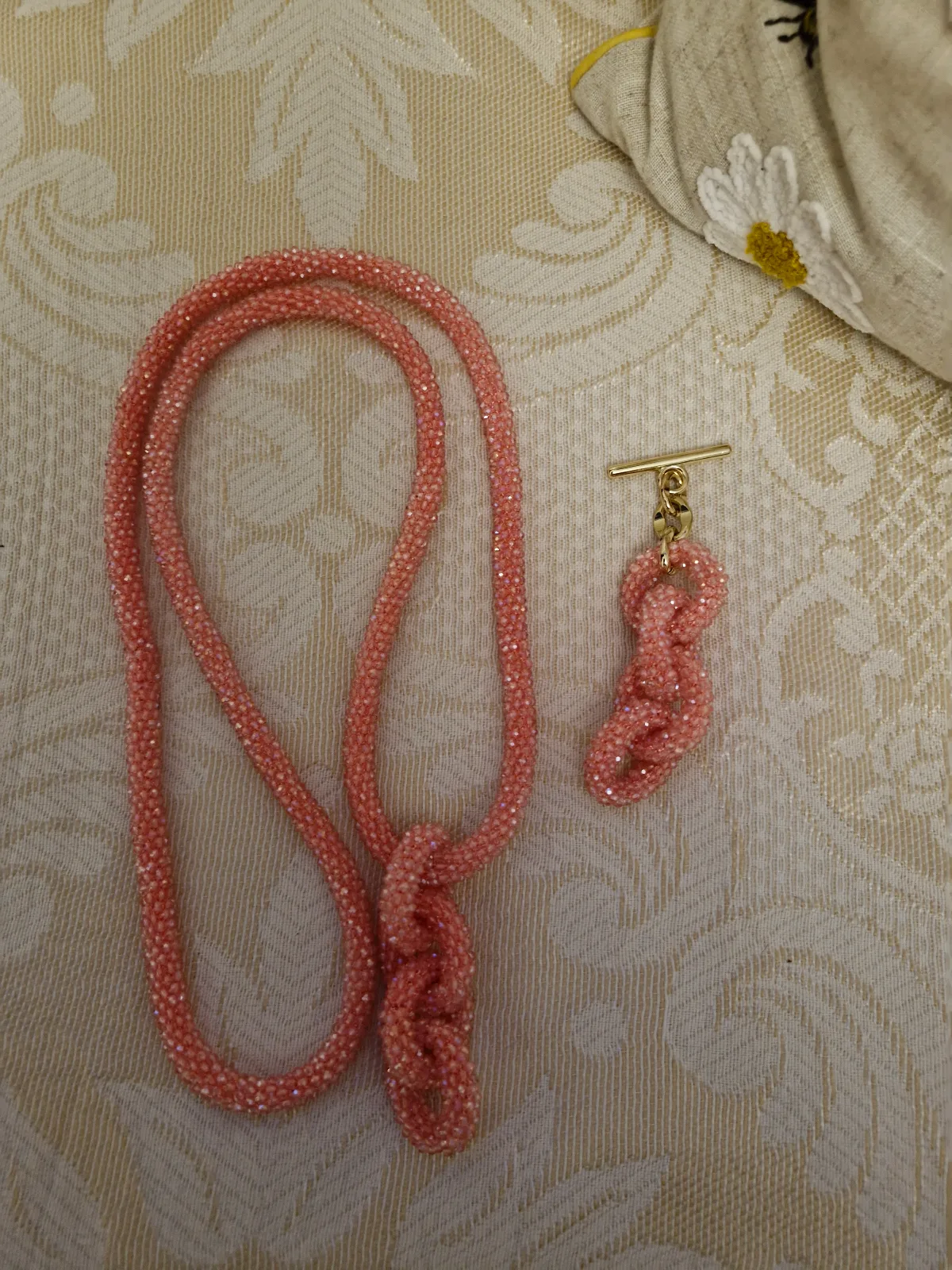 Coral kings knot strap and matching tbar tassel ghw 
