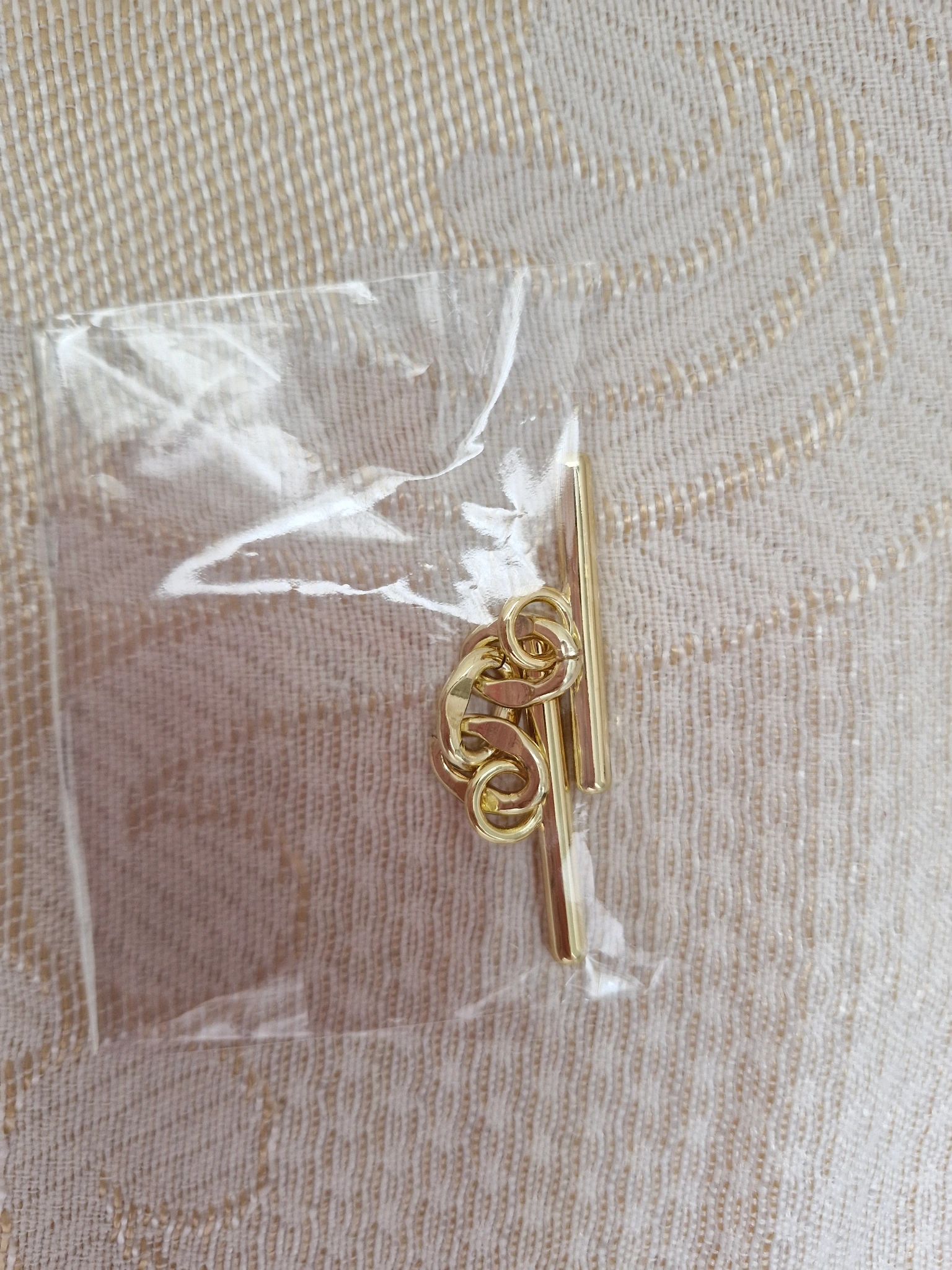 Gold toggle 