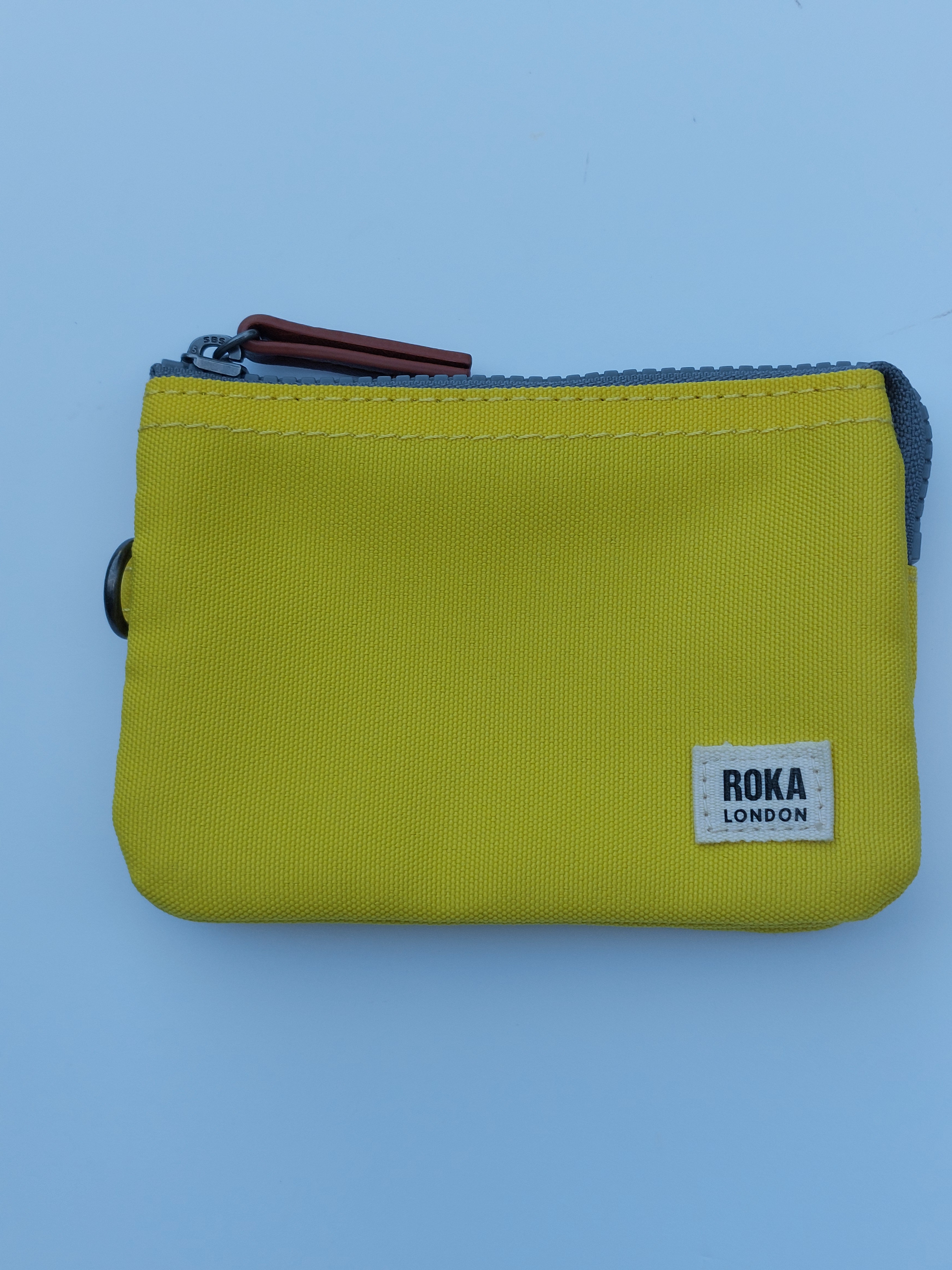 Yellow camden p backpack and carnaby purse