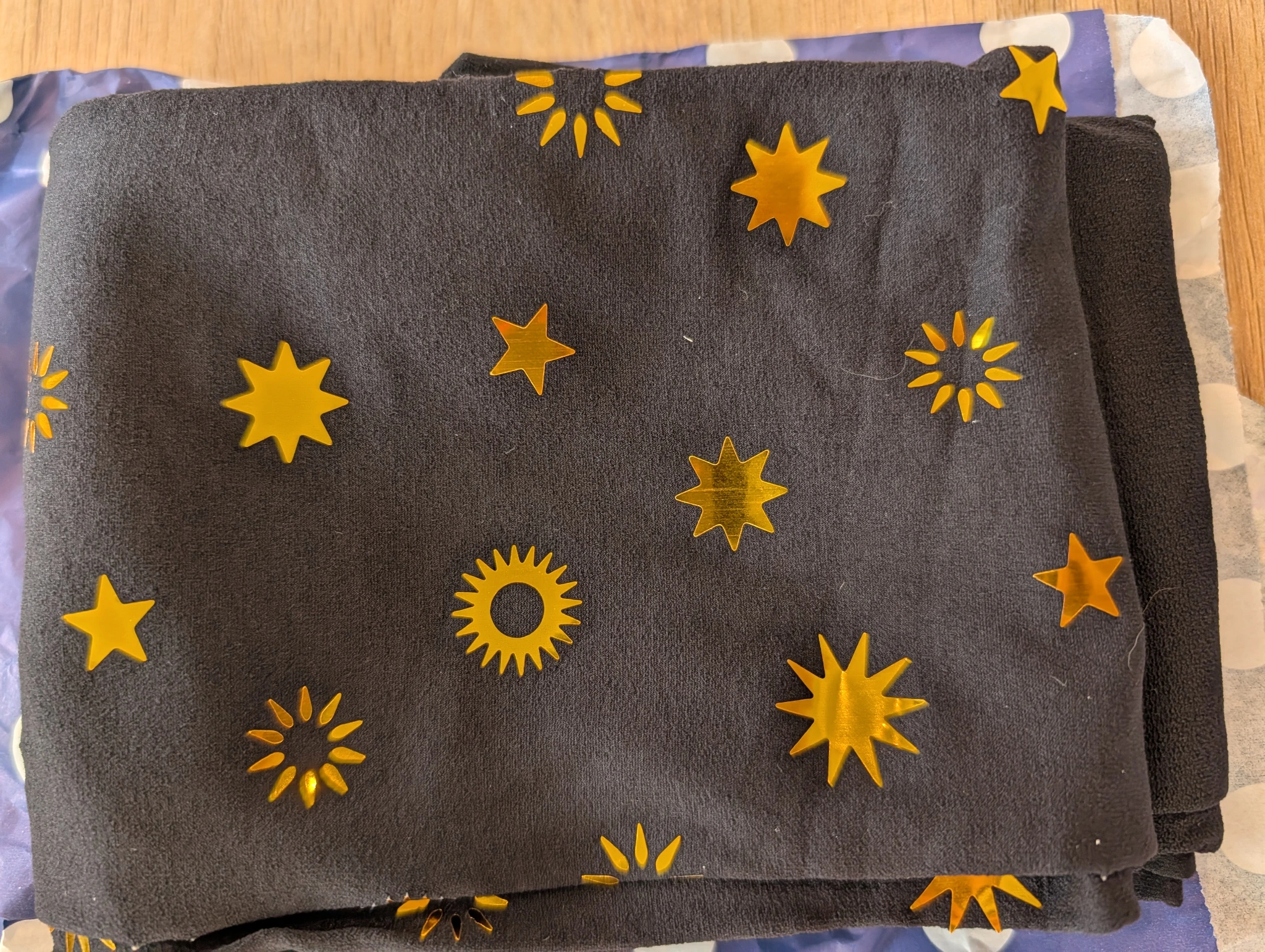 Sun and star black and gold tights 