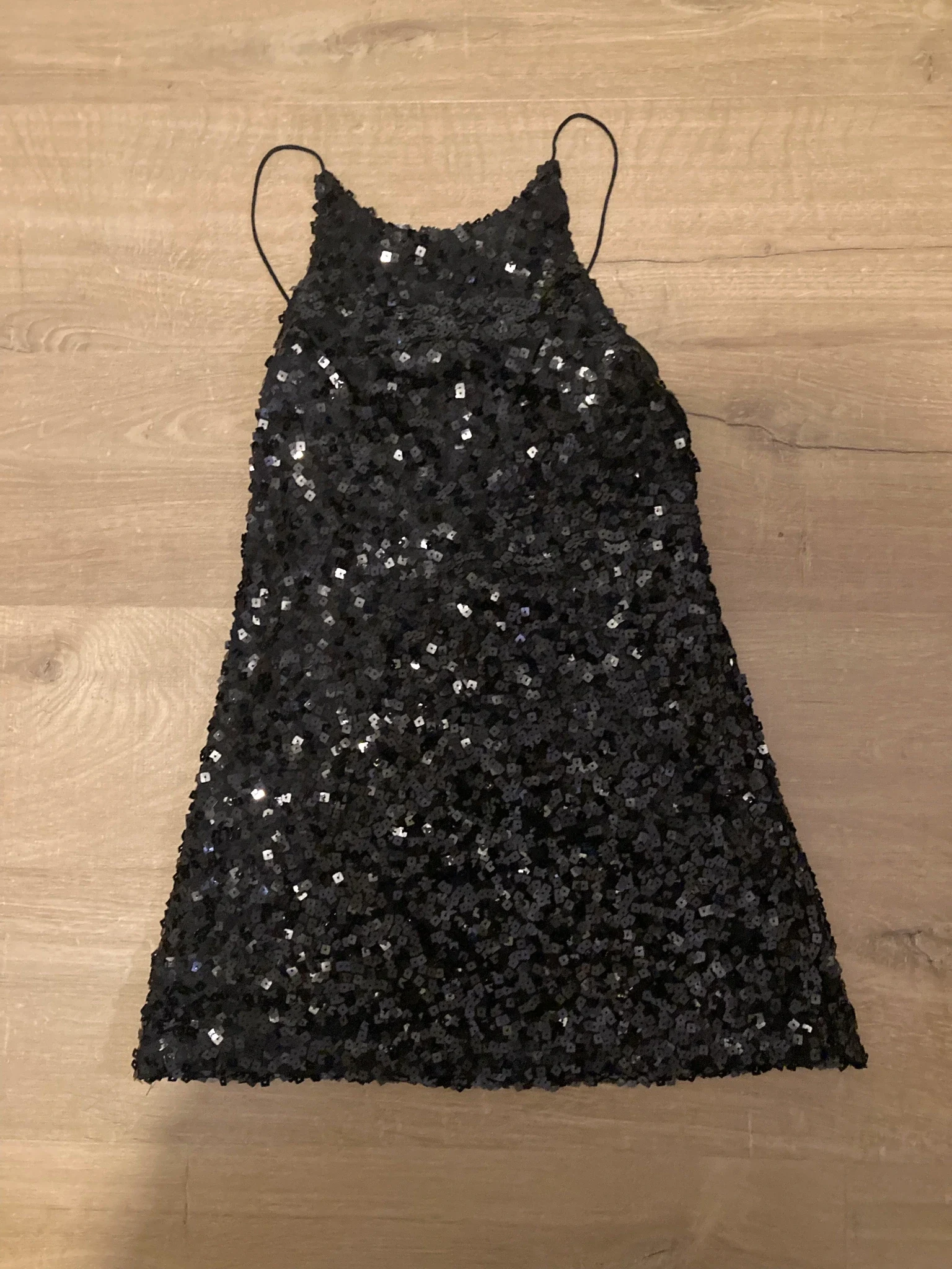 backless black sequin mini dress