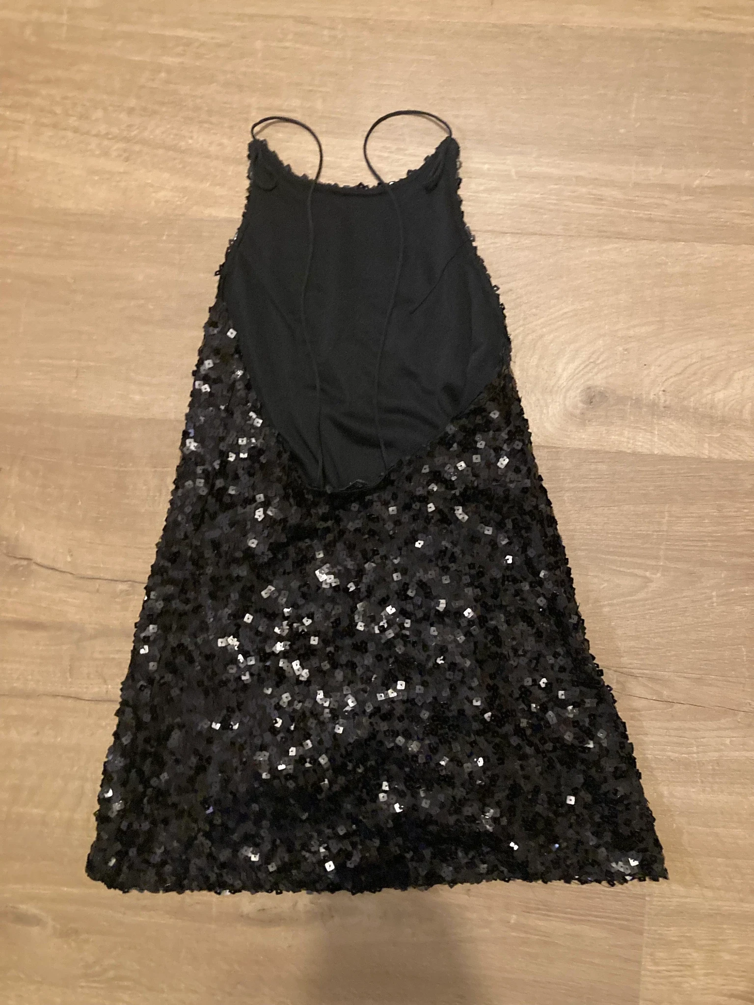 backless black sequin mini dress
