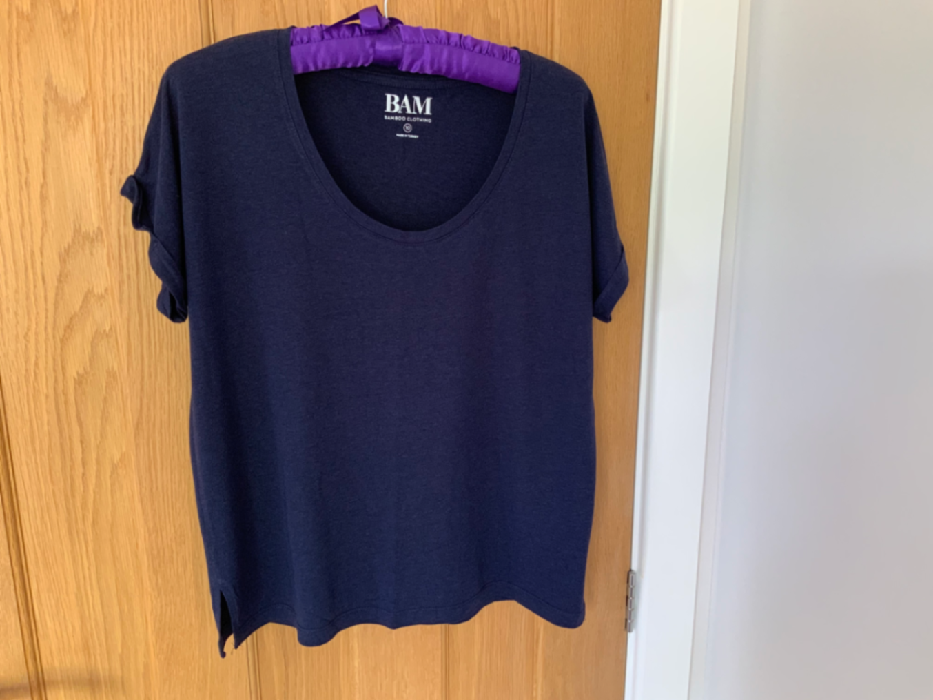 Navy top, low neck, size 10