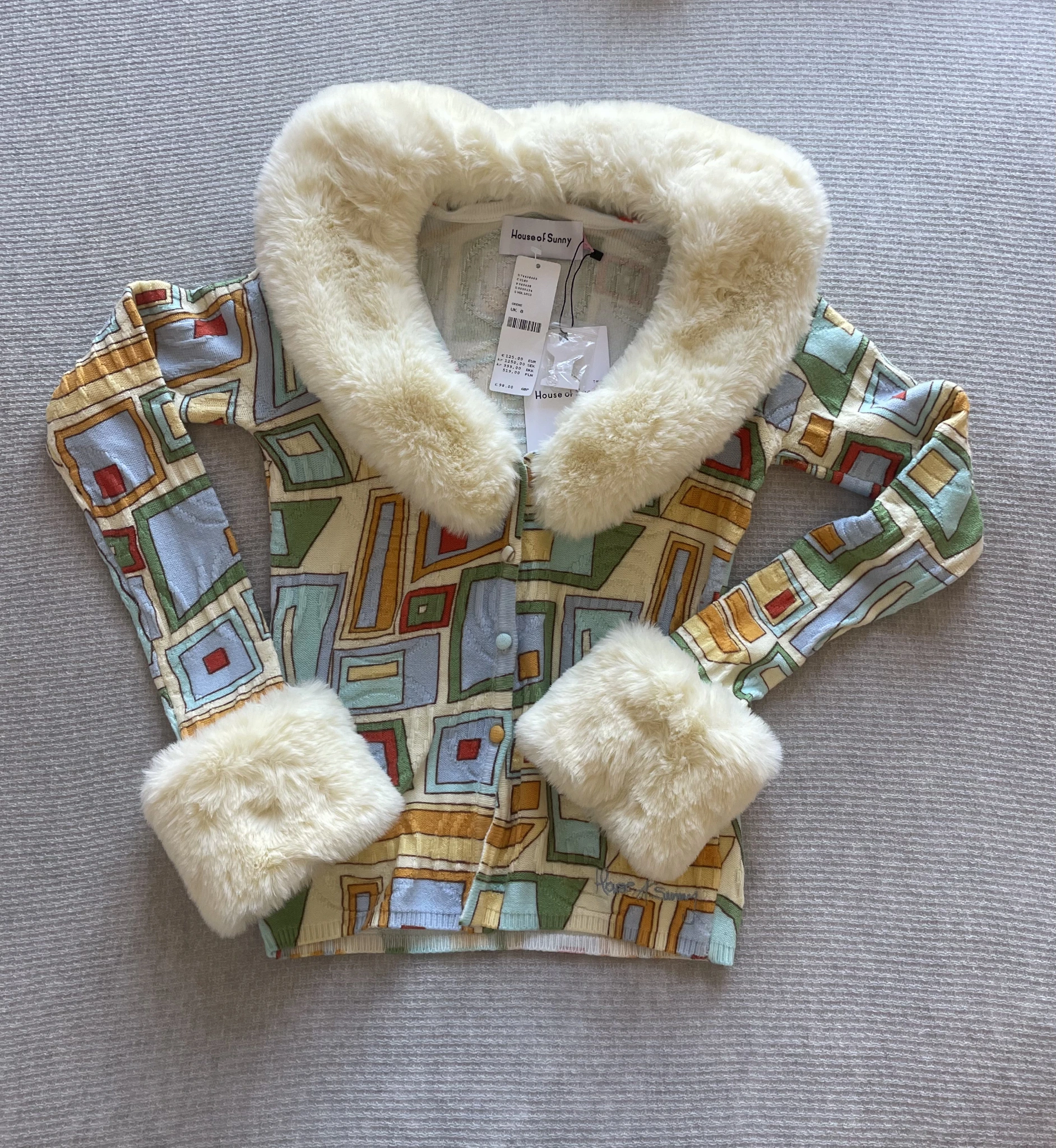 Cardigan top with removable fluffy trim