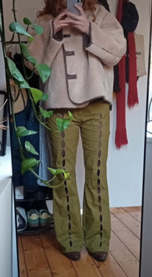 Flared trousers with cut-outs