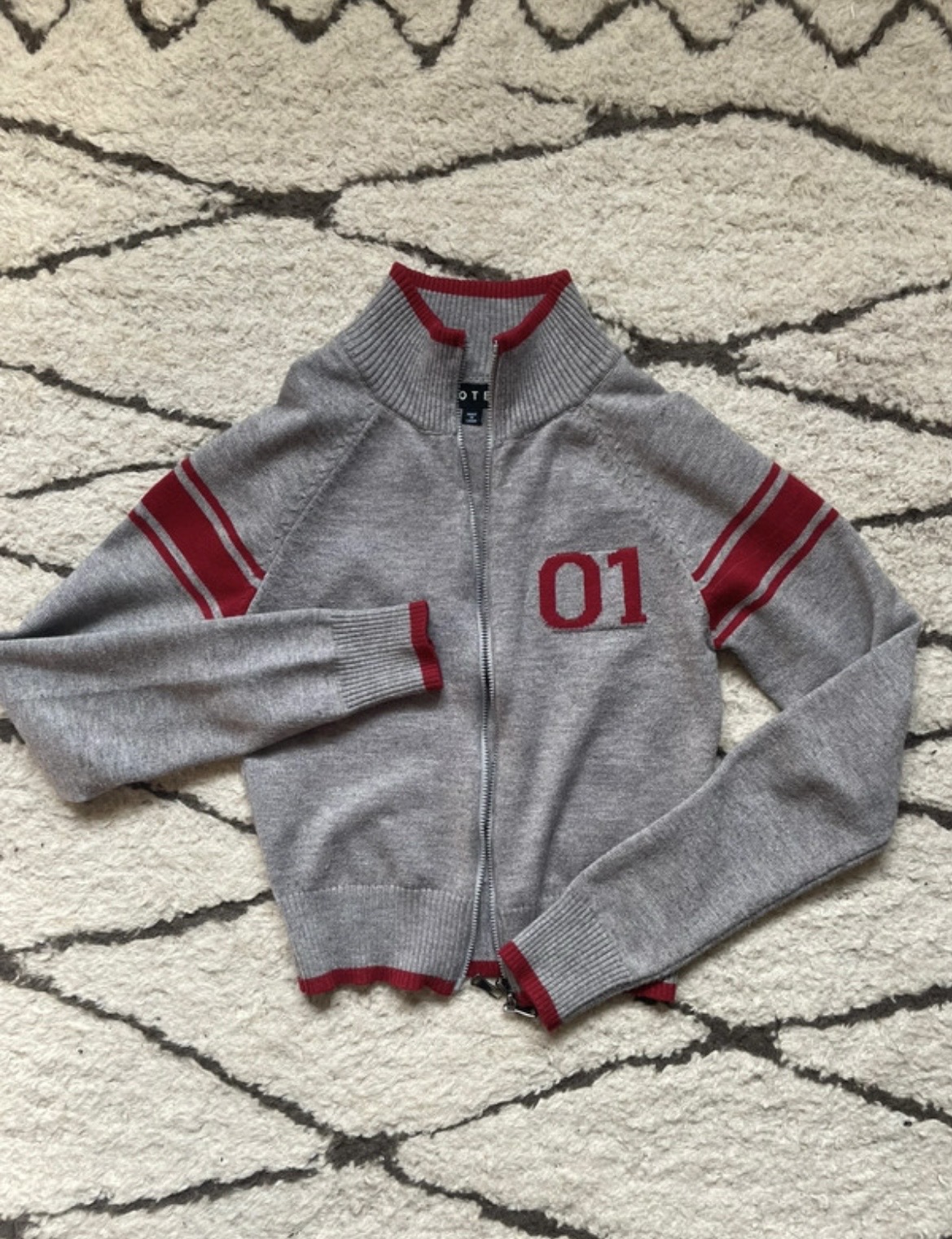 Tacita Zip Through Jacket In Grey With Red Motif