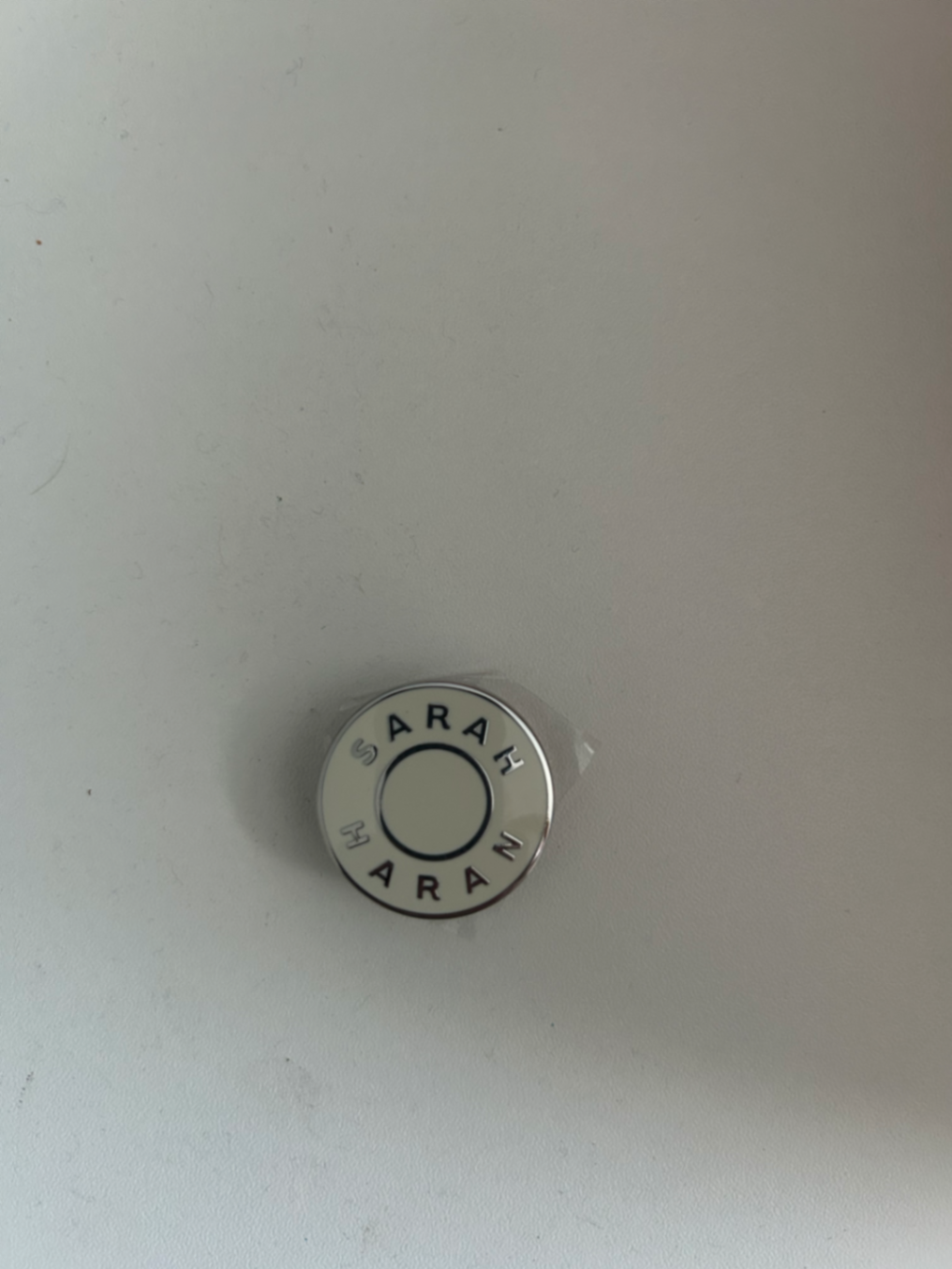 Insignia button SH