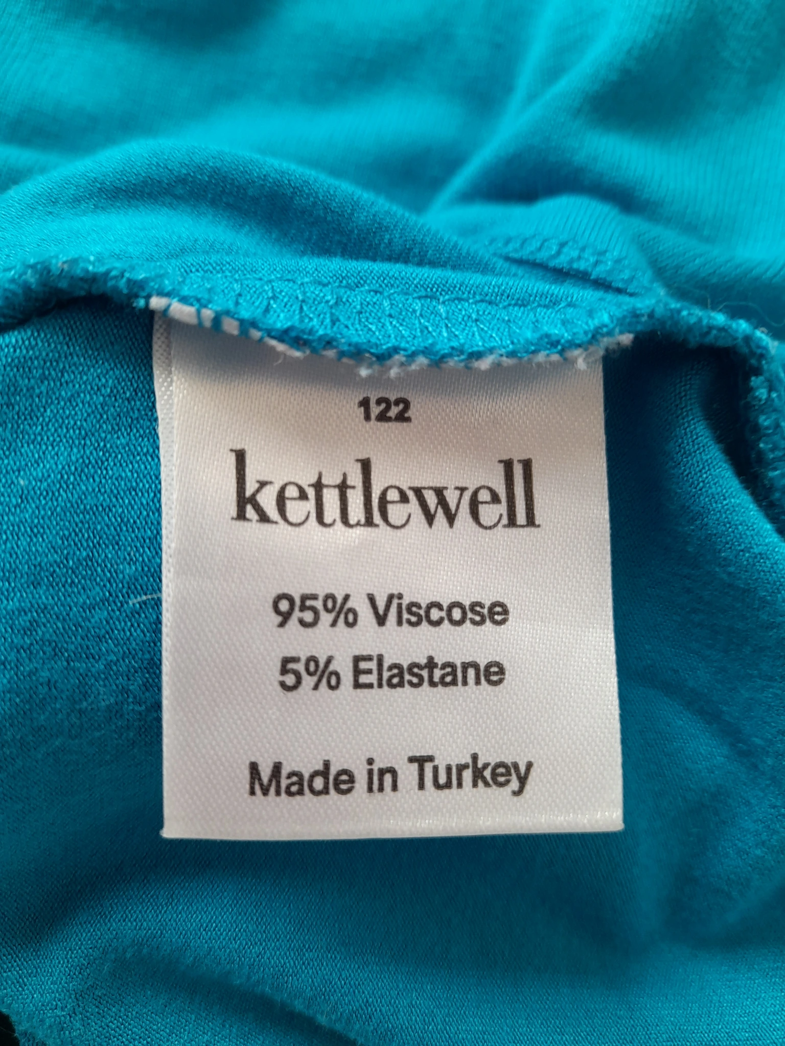 Lulu layered top in turquoise, size S