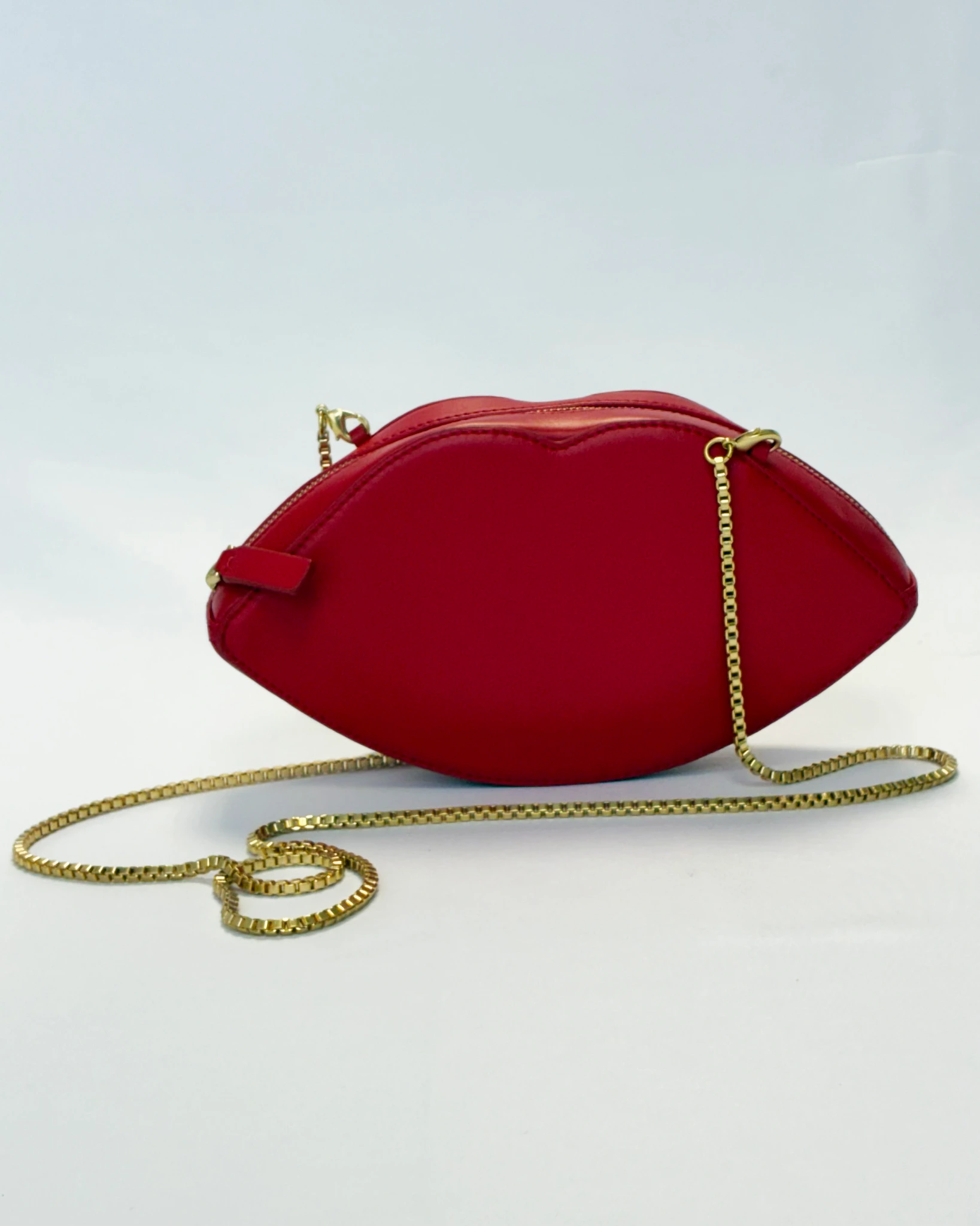 RED LEATHER LIP CLUTCH