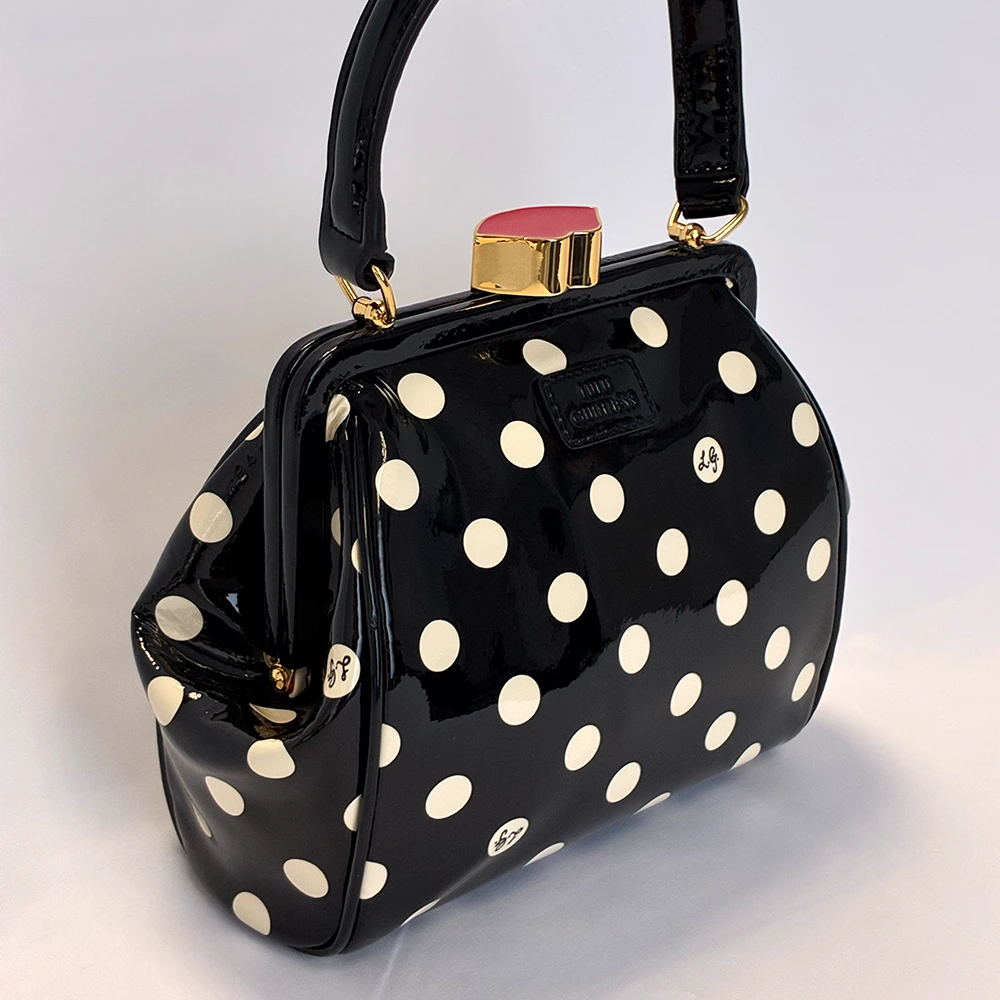 BLACK & WHITE POLKA DOT EVA BABY FRAME HANDBAG