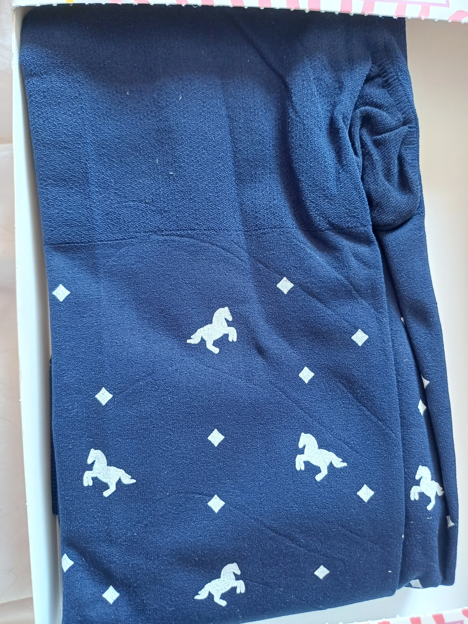 Snag tights navy with horses