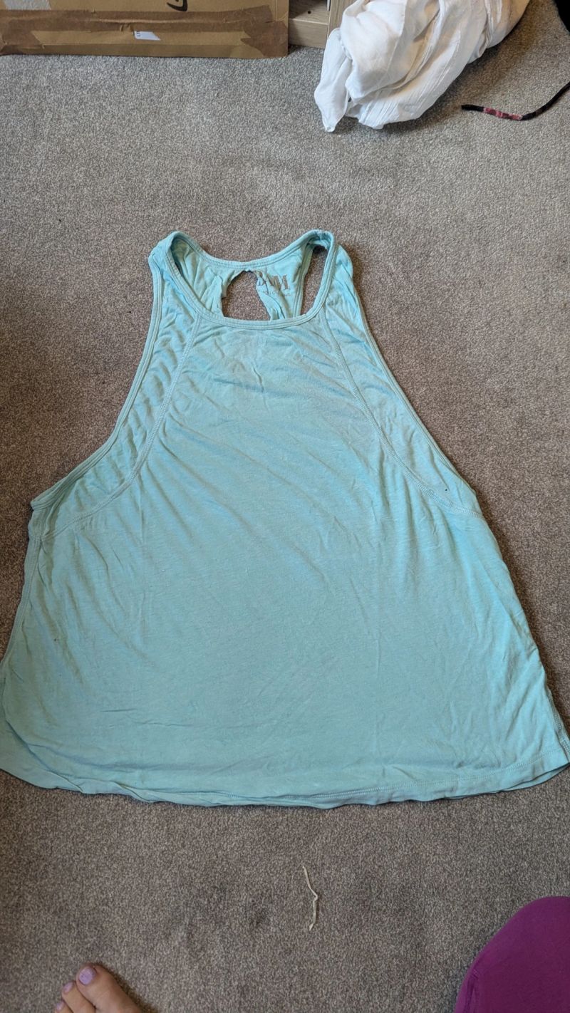 Low arm swing vest, light turquoise size 10