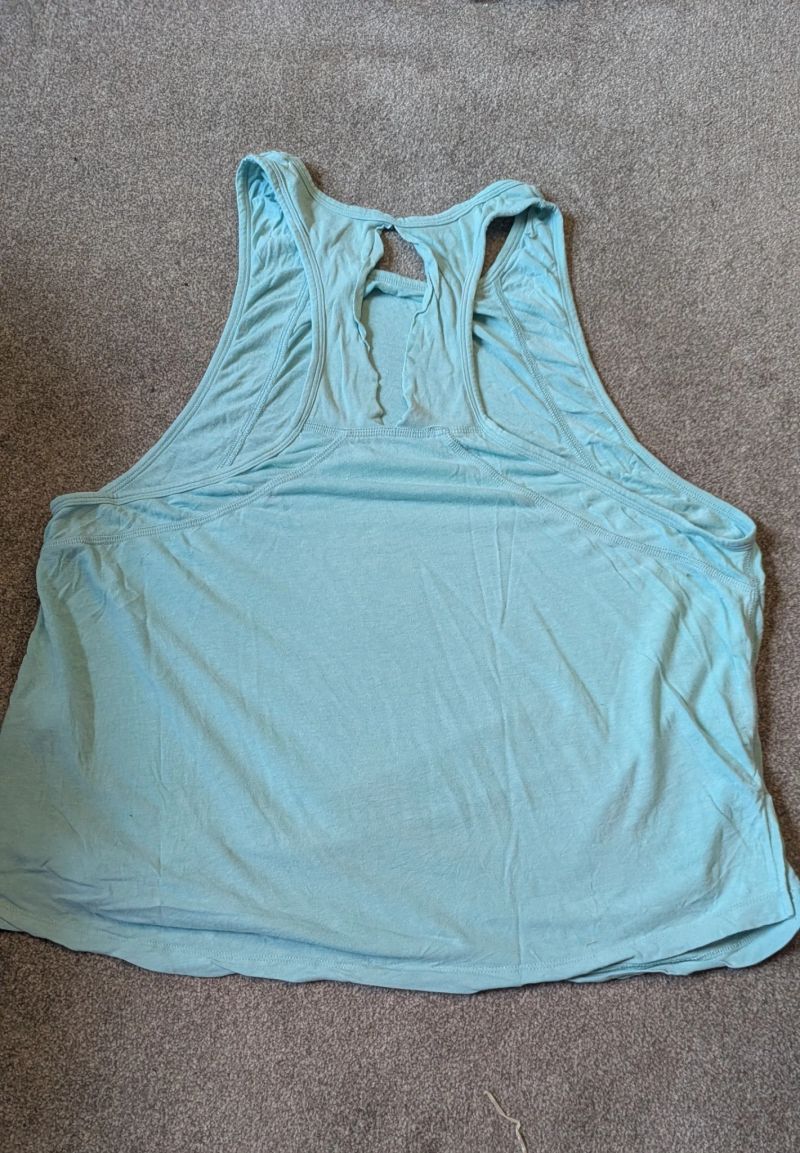 Low arm swing vest, light turquoise size 10