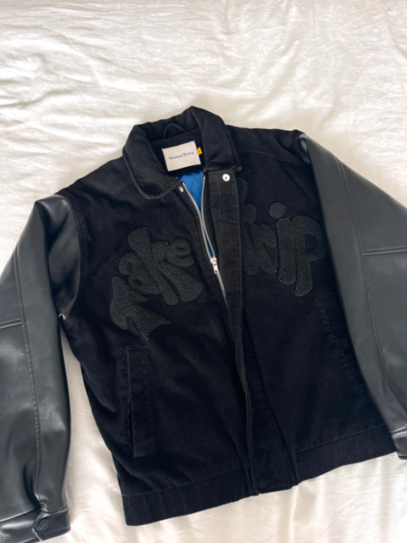 House of Sunny black coord / leather collared bomber zip up jacket with "Take a Trip" slogan