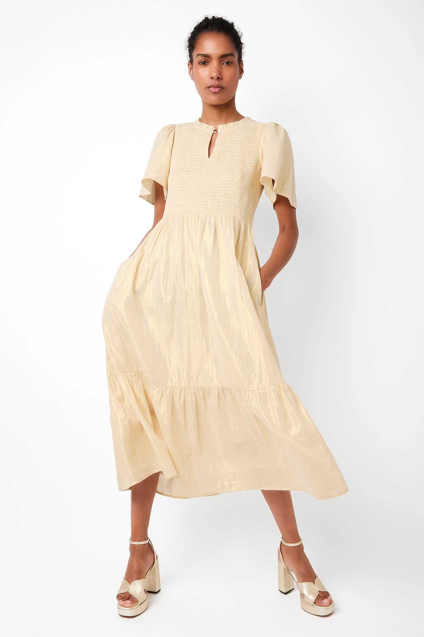 wyse gold dress A dress made with lovedesigned for her brother's wedding Marielle created  Leila, a showstopper of a dress in a silk lame mix, with bell sleeves and  buttons on the front (so you